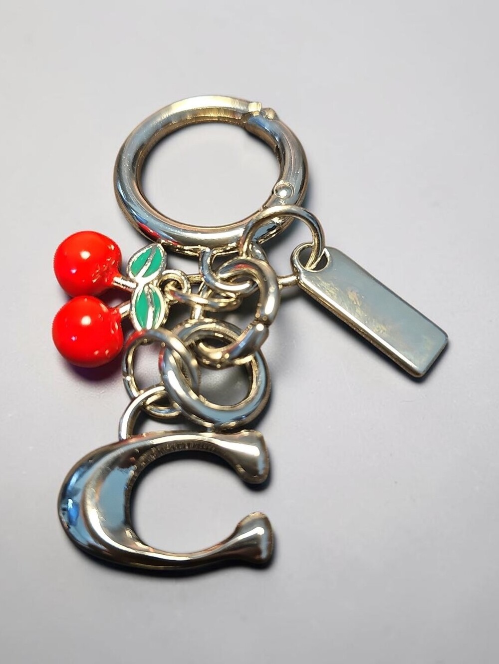 Sassified BOUTIQUE NWT Silver Cherry Charm Keychain with Red Enamel Accents